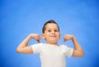 beauty-smiling-sport-child-boy-showing-his-biceps