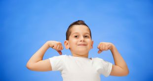 beauty-smiling-sport-child-boy-showing-his-biceps