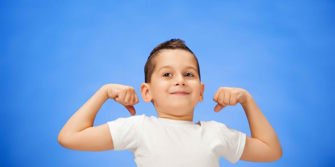 beauty-smiling-sport-child-boy-showing-his-biceps